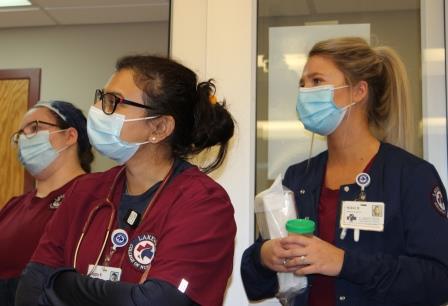 Students in Lakeview College of Nursing uniforms in lab setting.